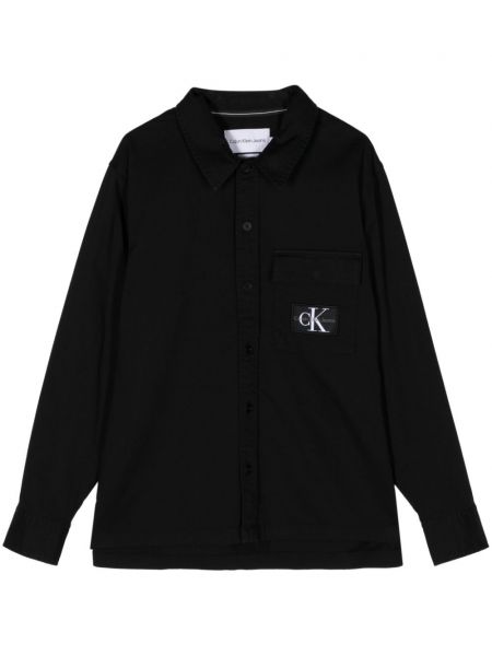 Raštuota marškiniai su sagomis Calvin Klein juoda