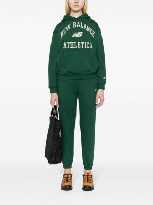 Haftowane spodnie sportowe bawełniane New Balance zielone