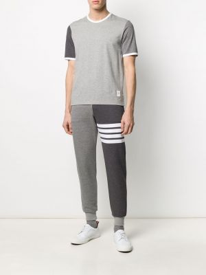 Sportovní kalhoty Thom Browne šedé