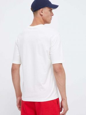 Bavlněné tričko s aplikacemi Reebok Classic béžové