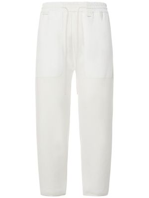 Bavlnené teplákové nohavice Moncler biela