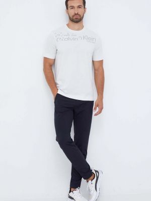 Koszulka z nadrukiem Calvin Klein Performance beżowa
