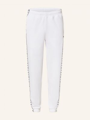 Sportovní kalhoty Lacoste bílé