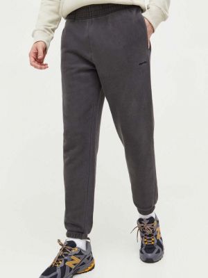 Sportovní kalhoty Superdry šedé