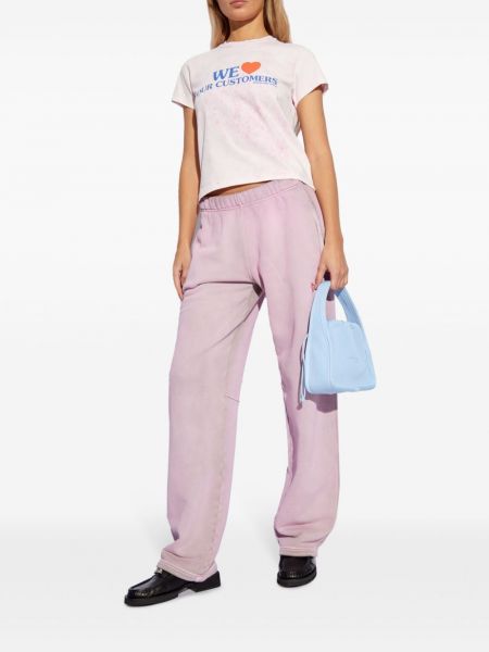 Bavlněné sportovní kalhoty s potiskem Alexander Wang růžové