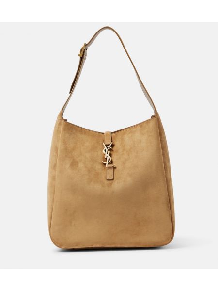 Ruskind store poser Saint Laurent beige