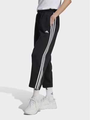 Pruhované fleecové sportovní kalhoty relaxed fit Adidas černé