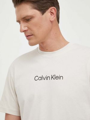 Kötött pamut nyomott mintás póló Calvin Klein - bézs