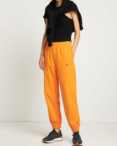Spodnie sportowe bawełniane z dżerseju Mcq pomarańczowe