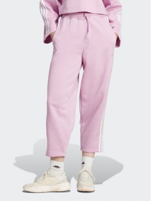 Pruhované fleecové sportovní kalhoty relaxed fit Adidas růžové