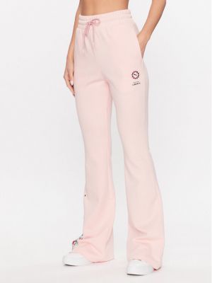 Sportovní kalhoty relaxed fit Puma růžové