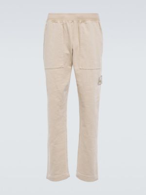 Pantaloni tuta di cotone in jersey Stone Island beige