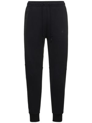 Fleecové běžecké kalhoty Nike černé