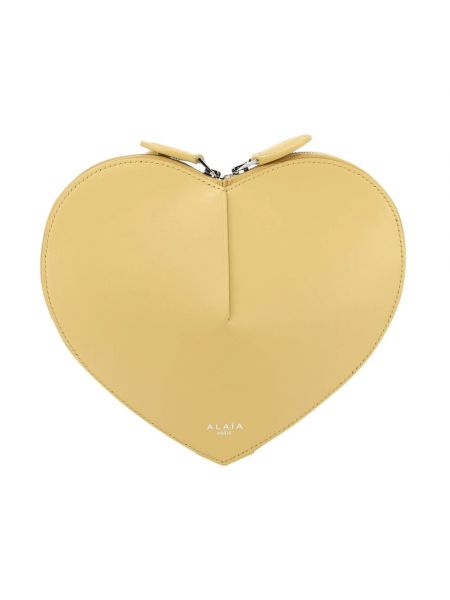 Żółta torba na ramię w serca Alaïa