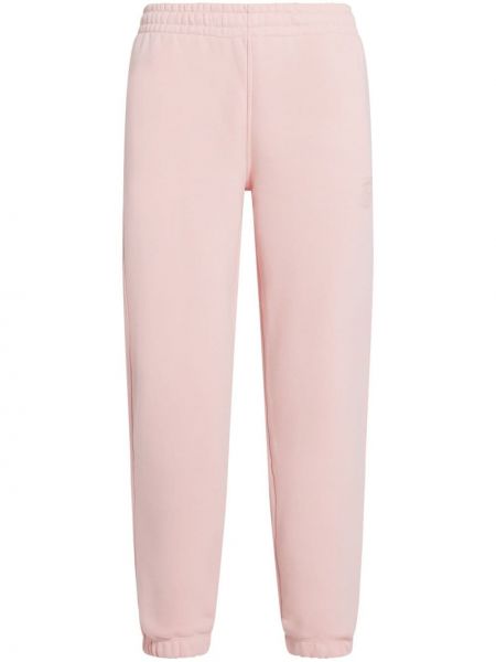 Spodnie bawełniane Lacoste różowe