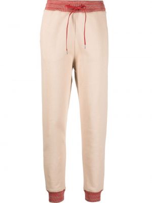 Bavlněné sportovní kalhoty s potiskem Vivienne Westwood - béžová