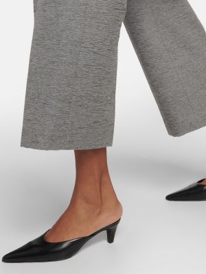 Vlněné kalhoty relaxed fit Totême šedé