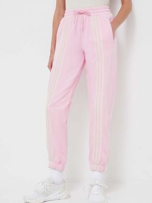 Spodnie sportowe bawełniane Adidas Originals różowe