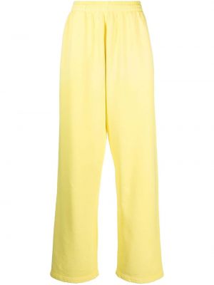 Obnosené teplákové nohavice Mainless žltá