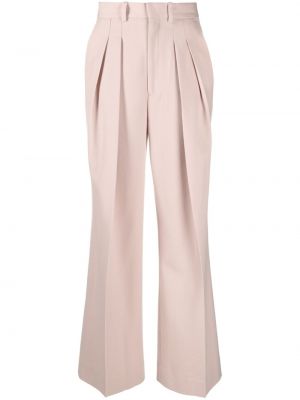 Spodnie relaxed fit plisowane Victoria Beckham różowe