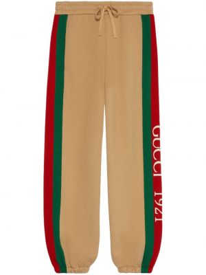 Bavlnené teplákové nohavice s výšivkou Gucci