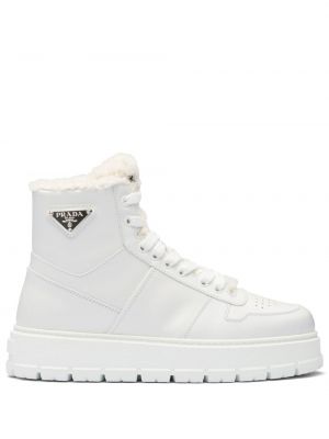 Białe sneakersy Prada