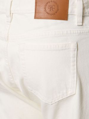Priliehavé džínsy Sporty & Rich biela