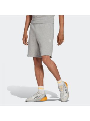 Športové priliehavé šortky Adidas Originals sivá
