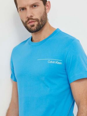 Koszulka bawełniana z nadrukiem Calvin Klein niebieska