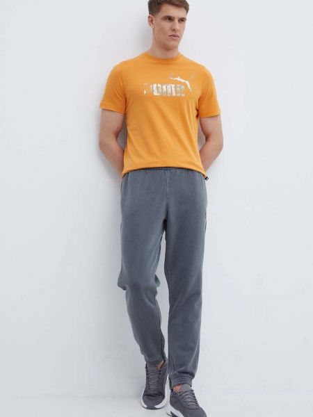 Бавовняна футболка з принтом Puma помаранчева
