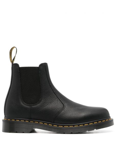 Nahka korkeat litteät saappaat Dr. Martens musta