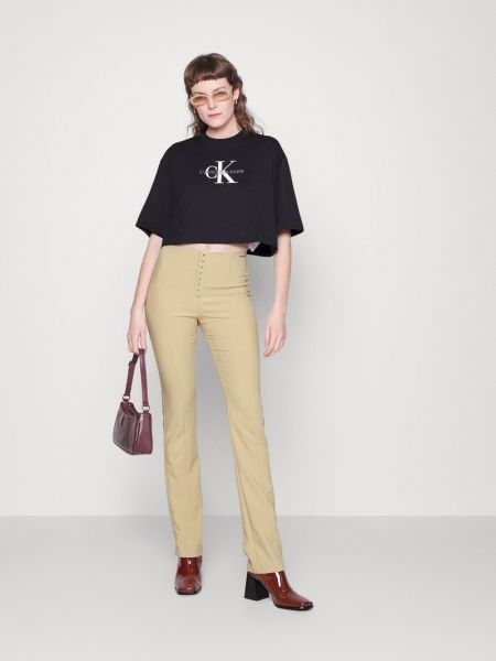 Spodnie Calvin Klein Jeans beżowe