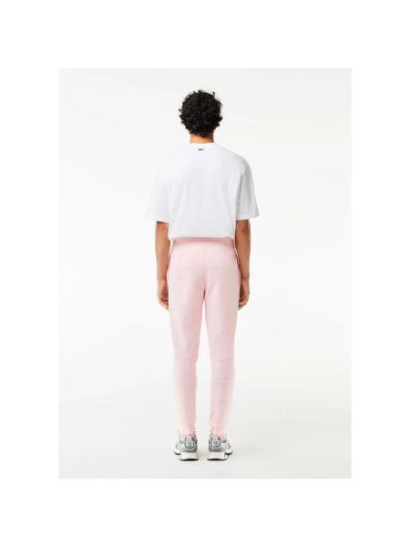 Pantalones de chándal con bordado Lacoste rosa