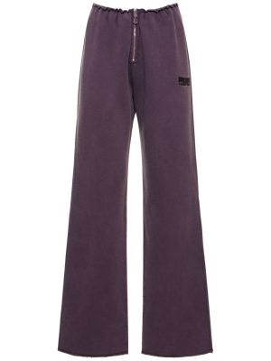 Bavlnené teplákové nohavice Rotate fialová