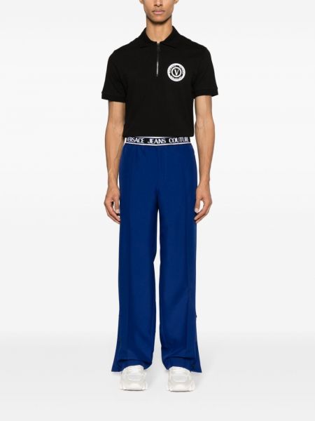 Plisované kalhoty relaxed fit Versace Jeans Couture