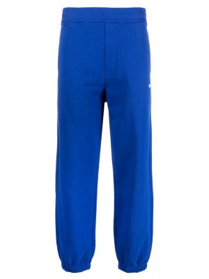 Bavlnené teplákové nohavice s potlačou Msgm modrá
