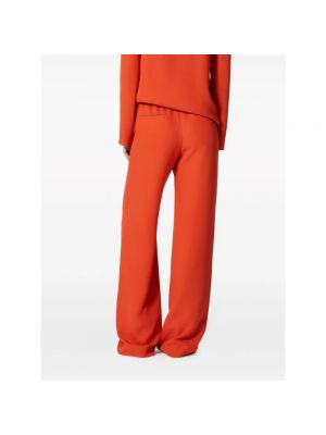 Pantalones de seda bootcut Valentino naranja
