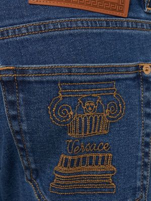 Medvilninės džinsai Versace mėlyna
