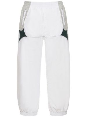 Kalhoty z nylonu Umbro bílé