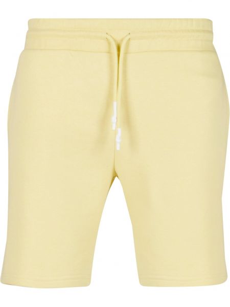 Teplákové nohavice Def žltá