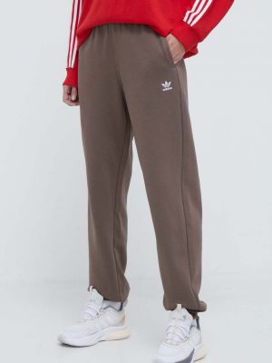Fleecové sportovní kalhoty Adidas Originals hnědé