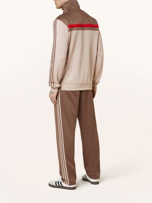 Spodnie sportowe Adidas Originals brązowe