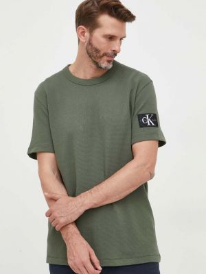 Памучна тениска с дълъг ръкав с апликация Calvin Klein Jeans зелено