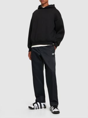 Pleteni bombažne ravne hlače Nike črna
