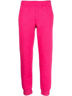 Spodnie sportowe żakardowe Moschino różowe