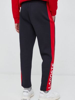 Sportovní kalhoty Lacoste červené