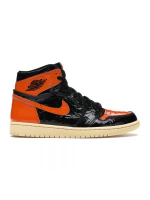 Pomarańczowe sneakersy Jordan 1 Retro