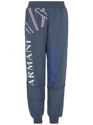Spodnie sportowe z nadrukiem Armani Exchange niebieskie