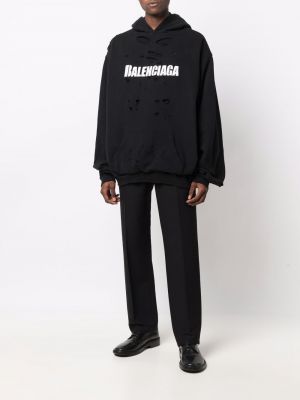 Apgrūtināti pulovers ar apdruku Balenciaga