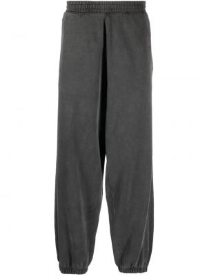 Bavlněné sportovní kalhoty Carhartt Wip šedé